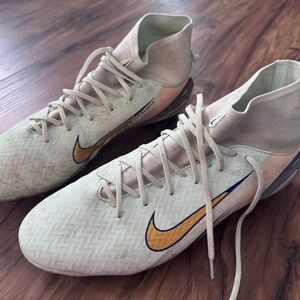 Nike Air Zoom Cleats with Gold and Blue Accents